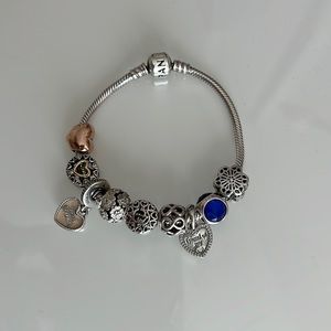 Pandora Bracelet with 9 charms.